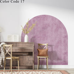 Watercolor texture boho arch wall decal used as a headboard behind a bed