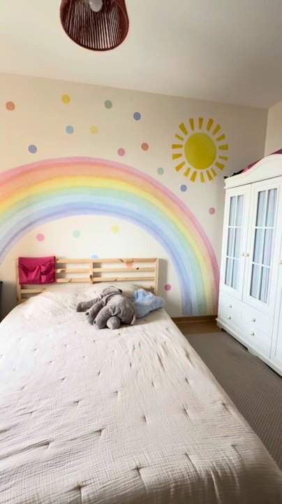 Rainbow and polka dot wall decal in a real kids room